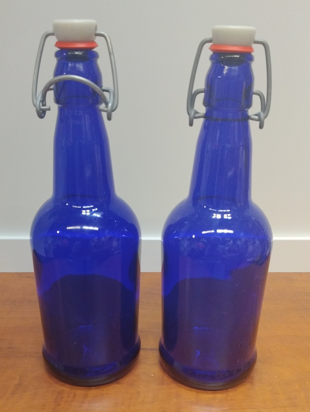 Set Of 2 Cobalt Blue Glass Bottles Porcelain Swing Top 9" High